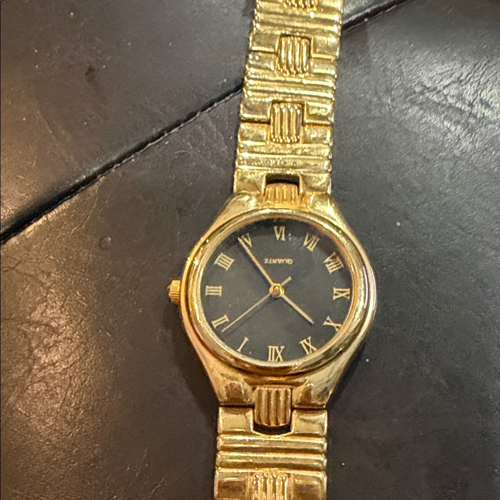 Gold Watch With Black Dial